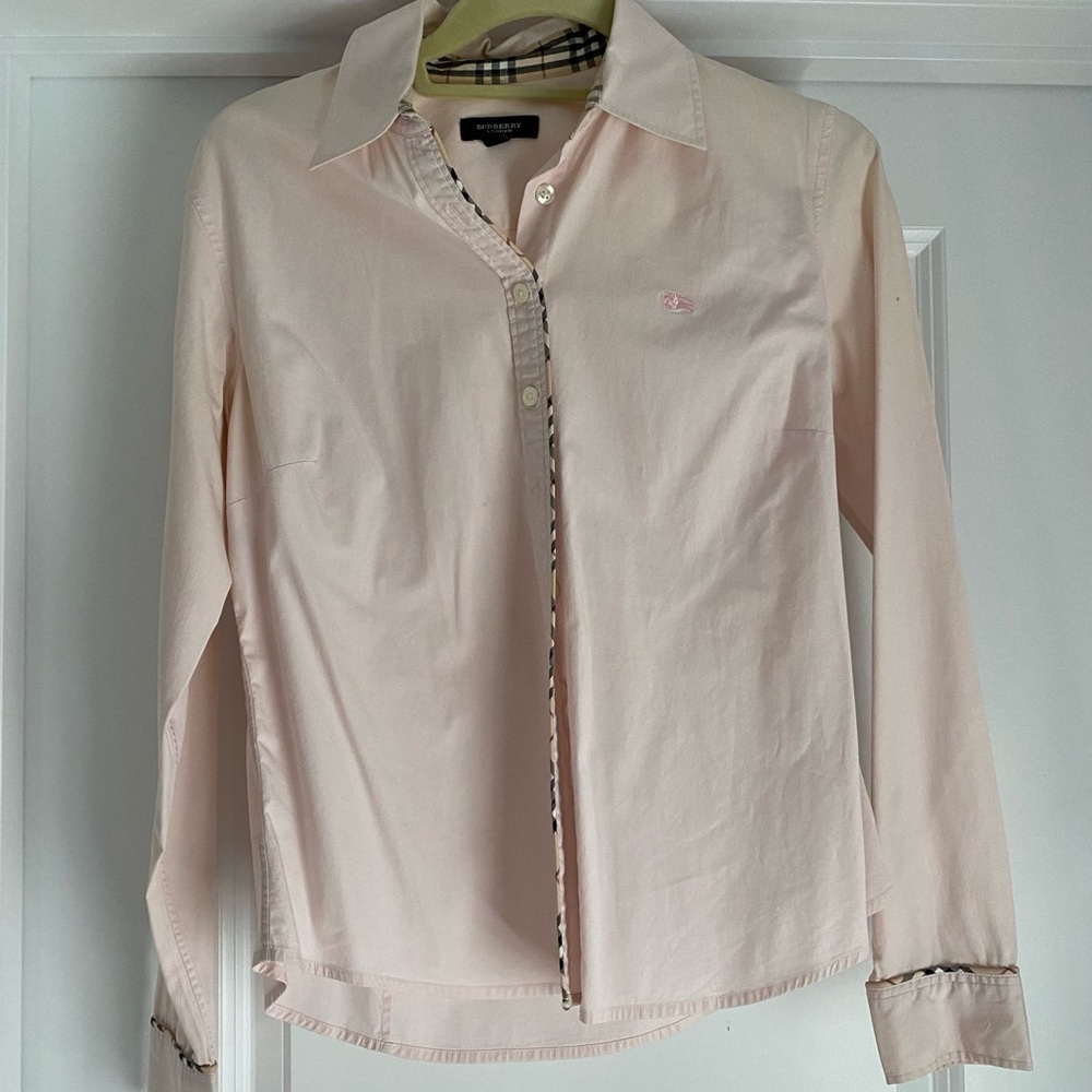 Light pink collared button down with Burberry trim